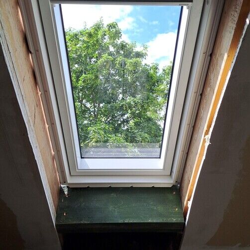 Customer image of VELUX GGU CK04 0070 White Maintenance-Free Centre Pivot Window - 55cm x 98cm