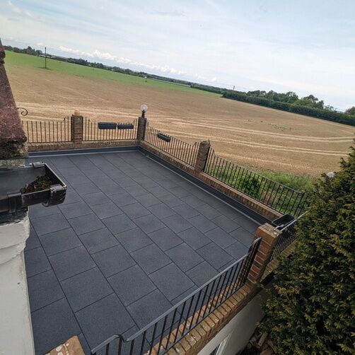 Customer image of Castle Composites Castleflex Rubber Interlocking Promenade Tiles (500mm x 500mm x 30mm)