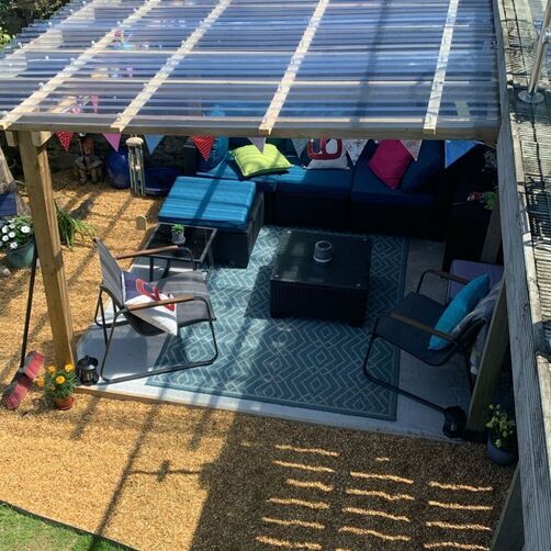 Customer image of Solstice Clear Screw Caps For Corrugated Roof Sheets - Pack of 50 (Caps Only)