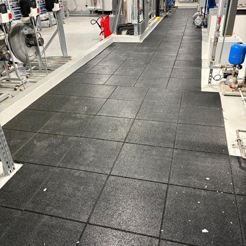 Customer image of Castle Composites Castleflex Rubber Interlocking Promenade Tiles (500mm x 500mm x 30mm)