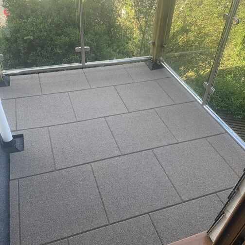 Customer image of Castle Composites Castleflex Rubber Interlocking Promenade Tiles (500mm x 500mm x 30mm)