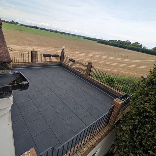 Customer image of Castle Composites Castleflex Rubber Interlocking Promenade Tiles (500mm x 500mm x 30mm)