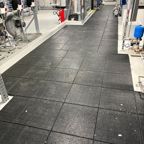 Customer image of Castle Composites Castleflex Rubber Interlocking Promenade Tiles (500mm x 500mm x 30mm)